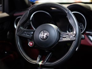Alfa Romeo Stelvio Steering Wheel Trim - Carbon Fiber - Lower Trim Set - QV Logo - QV Model Alfa Romeo Stelvio Steering Wheel Trim - Carbon Fiber - Lower Trim Set - QV Logo - QV Model